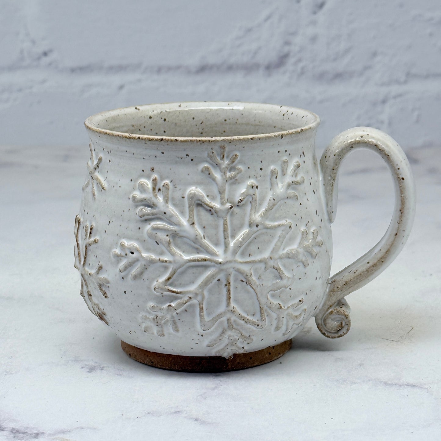 White with Raised Snowflakes Teacup 1