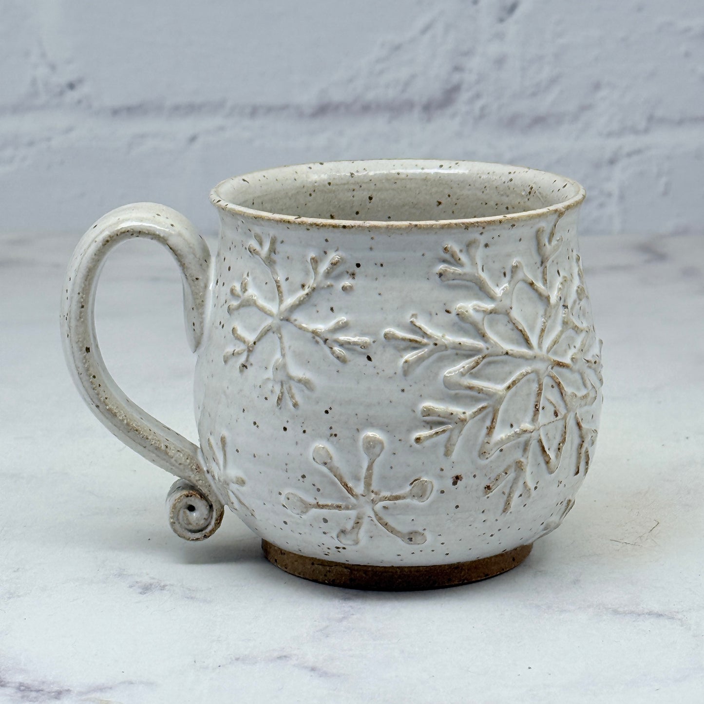 White with Raised Snowflakes Teacup 1
